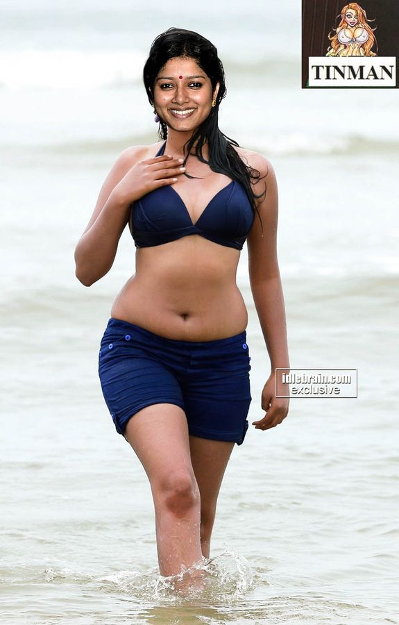 Anumol wet body in beach bikini nude navel hot mallu actress photo