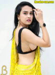 Anushka Kaushik semi nude youtuber boobs side view sleeveless blouse photo