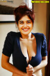 Busty boobs Urvi Singh deep cleavage low neck blouse stripping photo